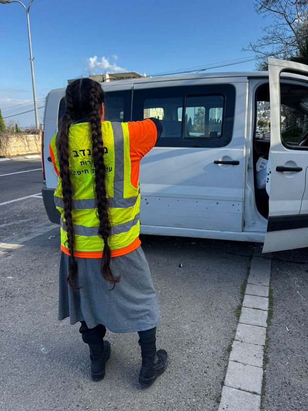 Ministry worker preparing for a delivery run